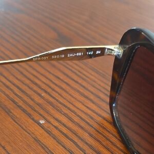 Prada Black and Gold Sunglasses